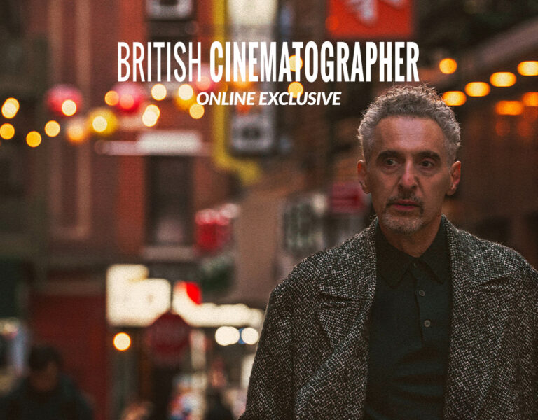 John Turturro walking down a New York street