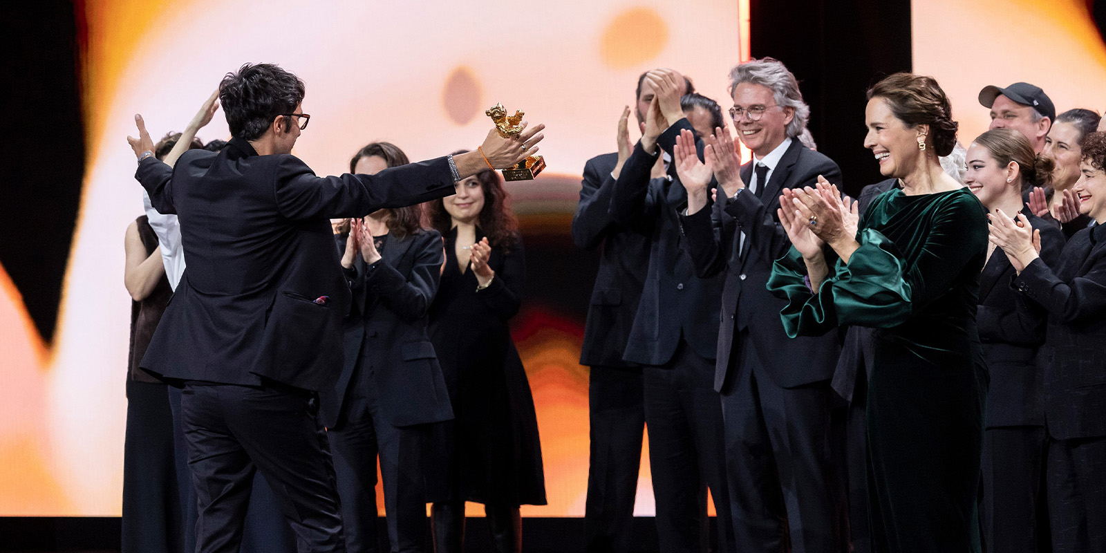 People celebrating on stage