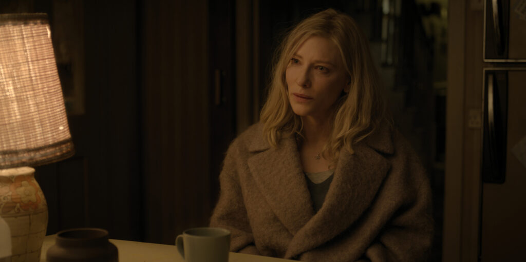 Cate Blanchett sat looking stern 