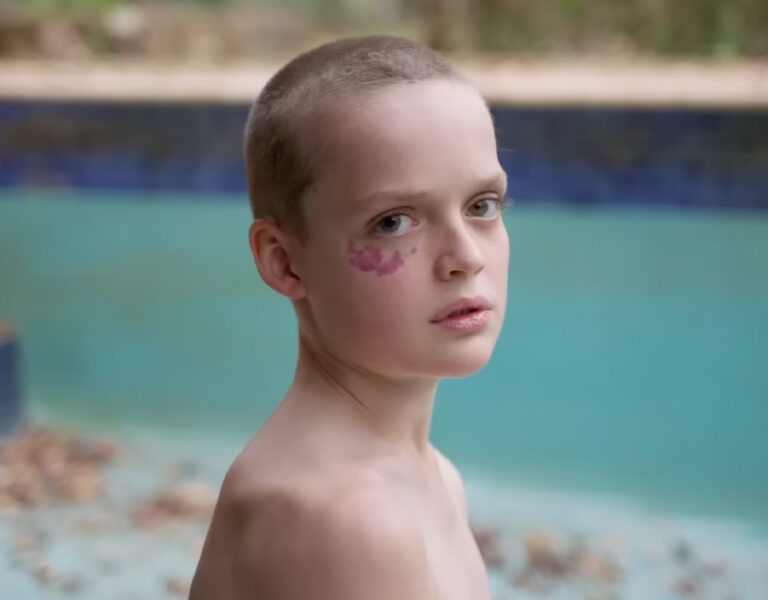 A boy looking into camera