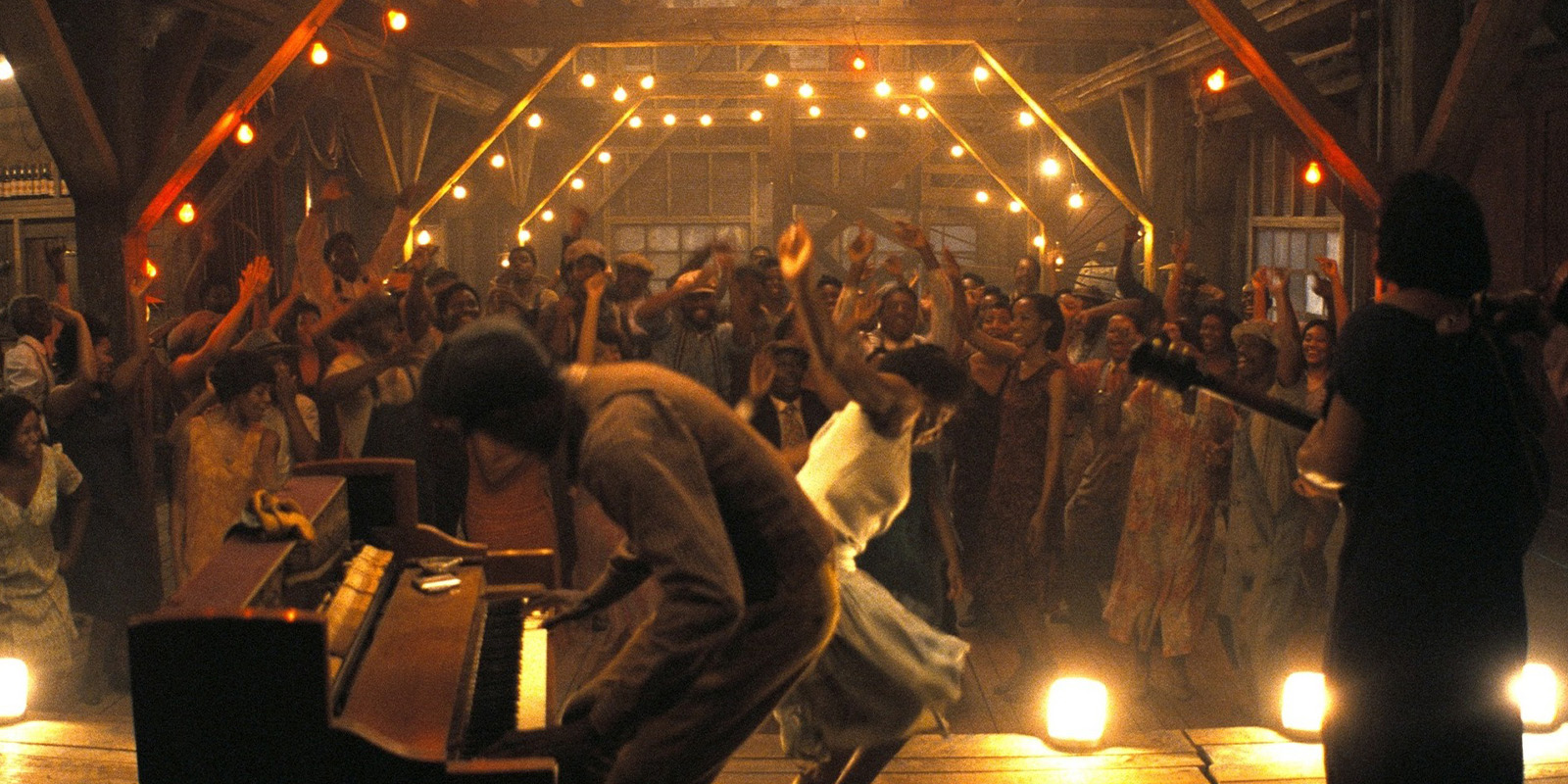 A group of people dancing in a juke joint