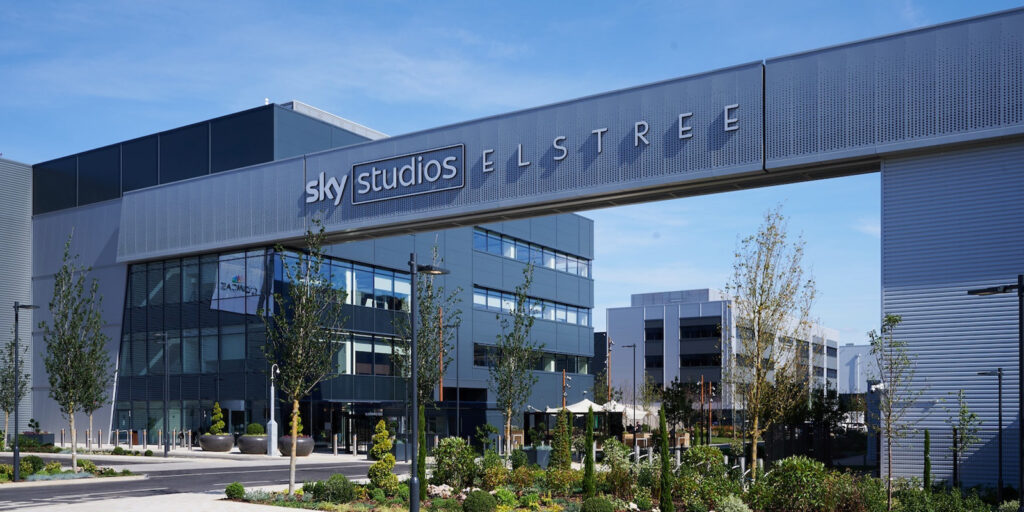 A general view of Sky Studios Elstree showing a grey sign and grey building
