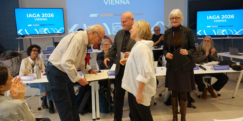 Paul René Roestad FNF and Dr Cristina Busch are awarded honorary membership in the AAC by Astrid Heubrandtner AAC and Kurt Brazda AAC