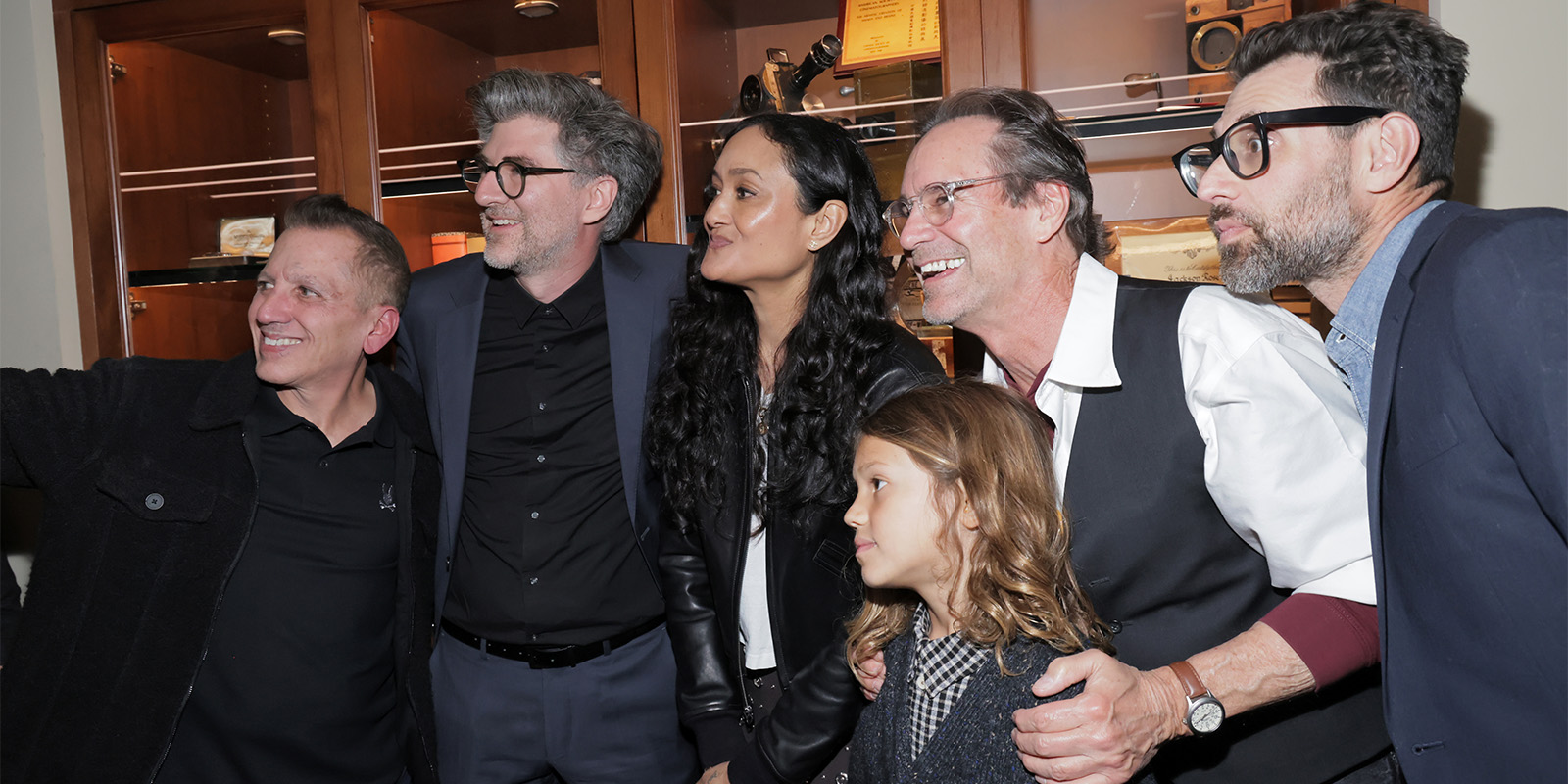 A group of people pose for a photo together