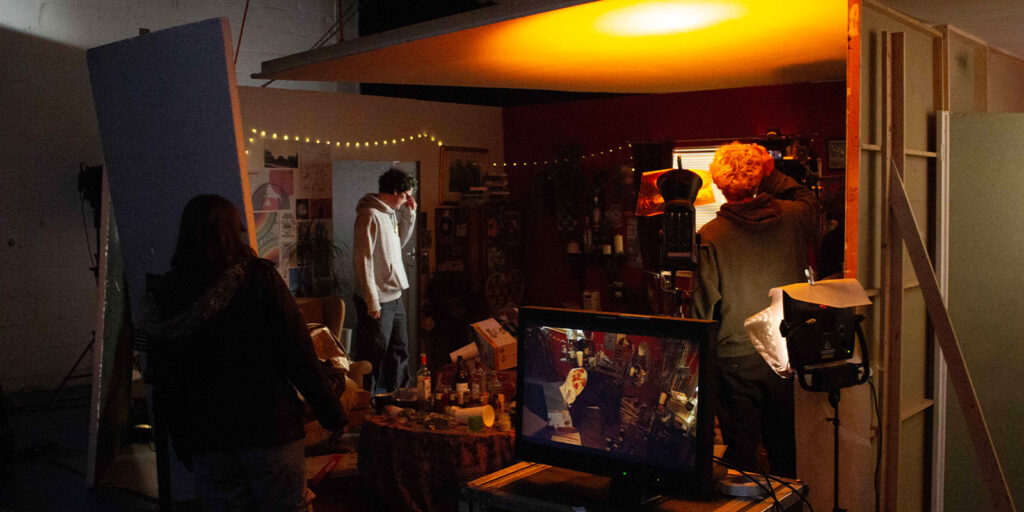 Students gathered on a film set