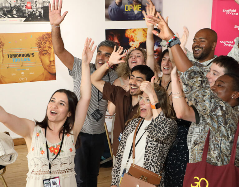 A group of people cheering together
