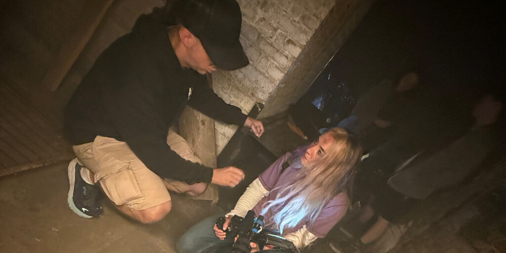 People gathered in a dark room 