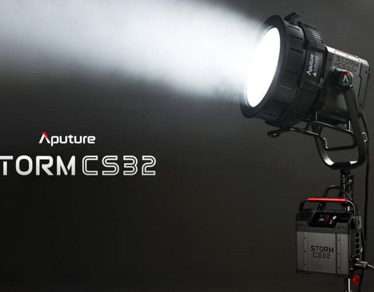An Aputure spotlight against a grey background