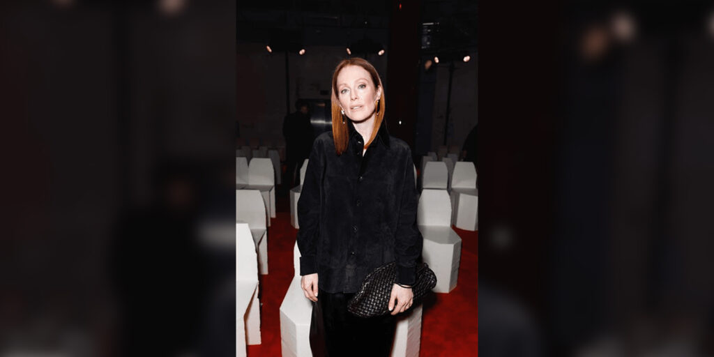 Julianne Moore in a cinema looking into camera
