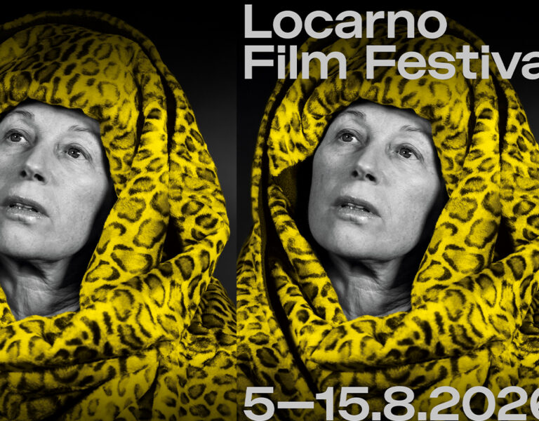 A poster showing a woman in a leopard headscarf