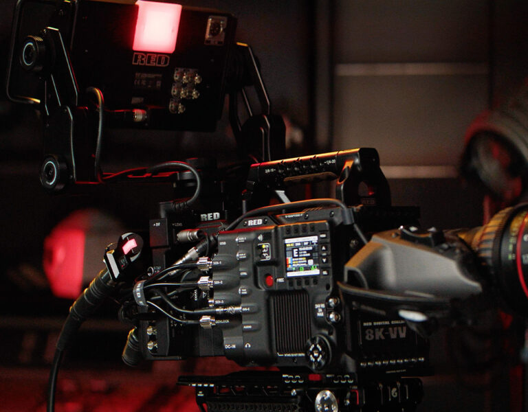 A large format camera under red lighting
