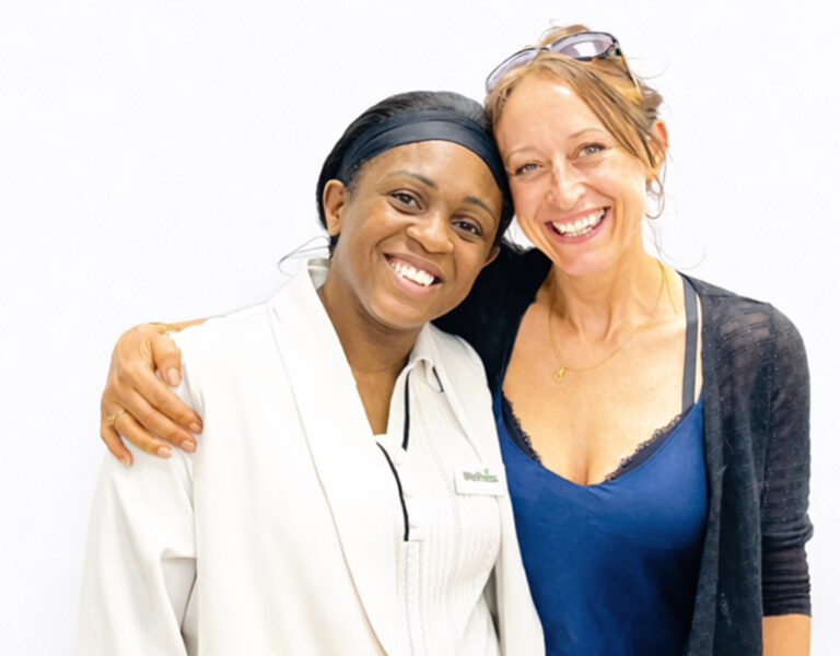 Clare Anyiam-Osigwe & Director Liz Farahadi standing and smiling together