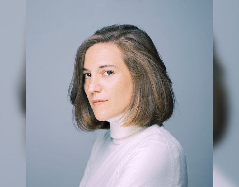 Screenwriter and director Carla Simón against a grey background