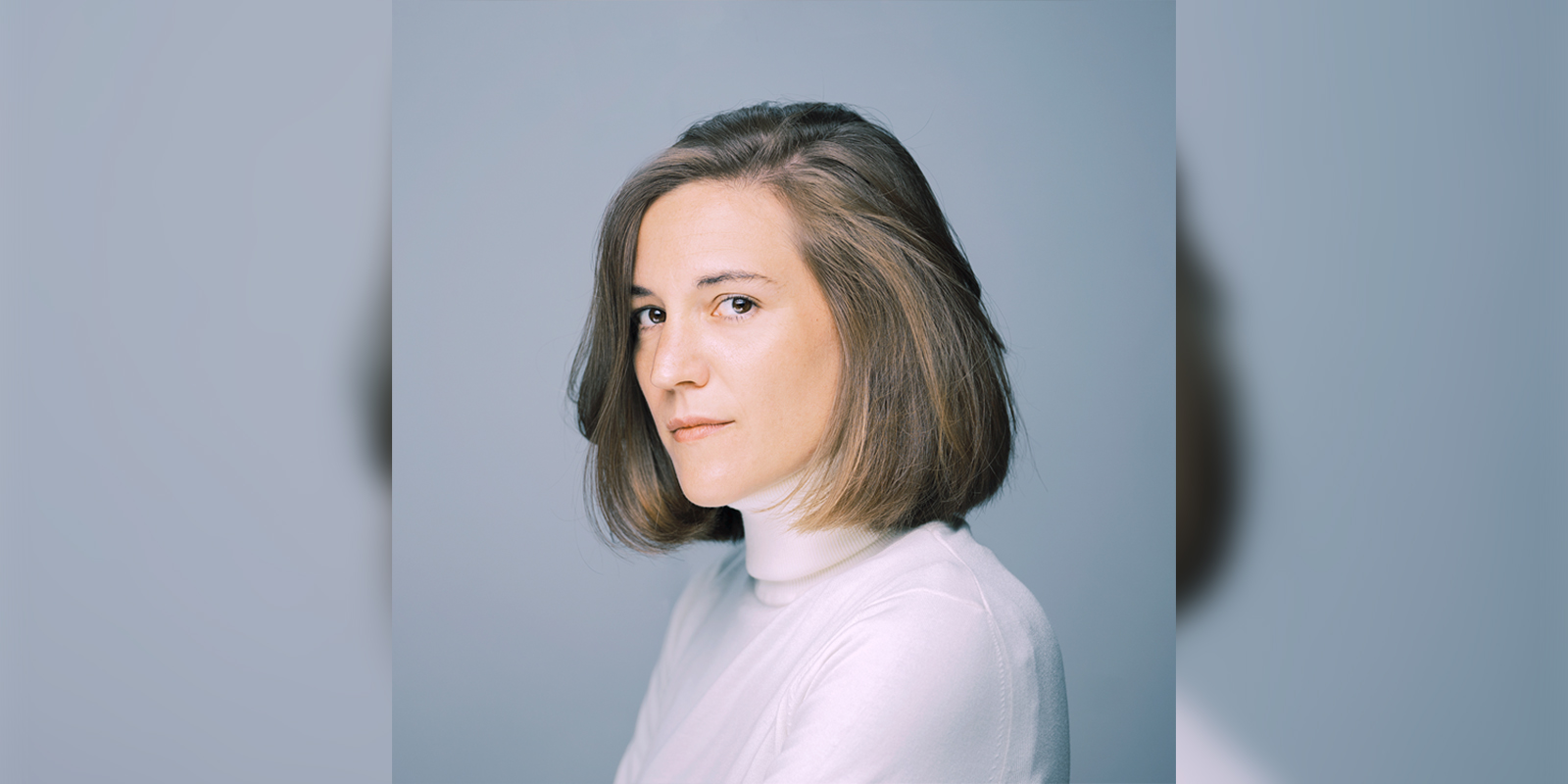 Screenwriter and director Carla Simón against a grey background