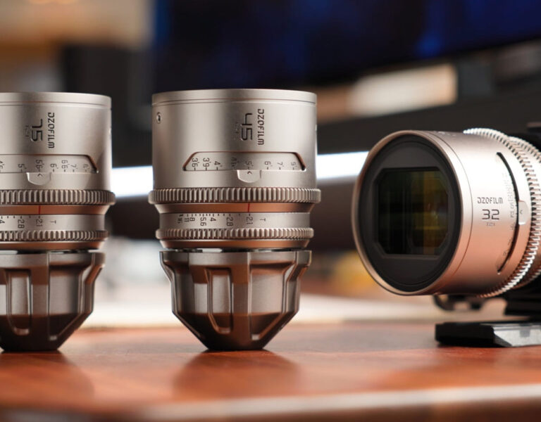Three lenses on a wooden table