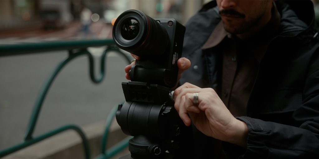 A person operating a camera