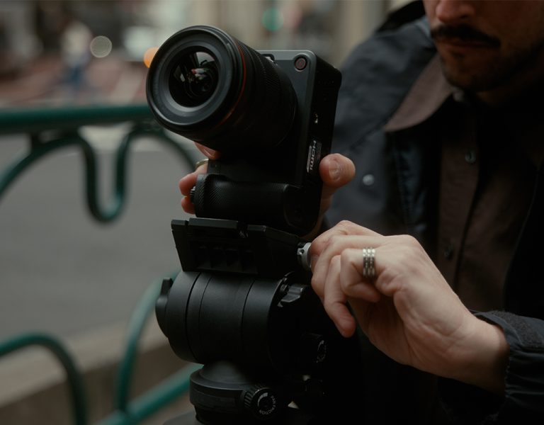 A person operating a camera