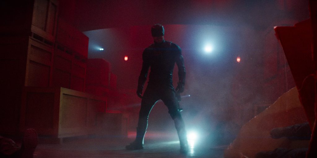 Daredevil stood in a dark environment 