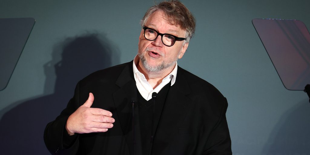 Del Toro speaking at a lectern