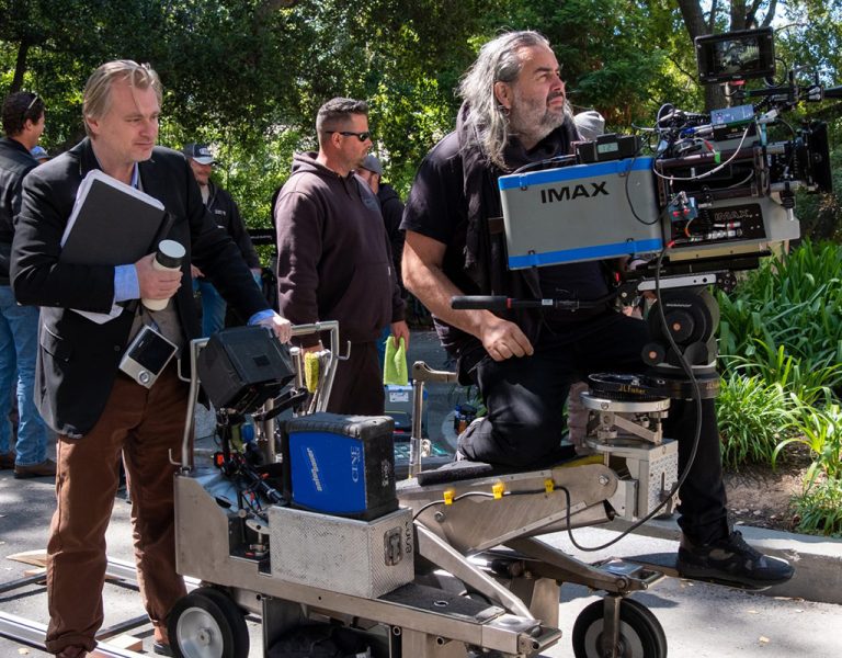 Christopher Nolan and Hoyte Van Hoytema sat on an IMAX rig