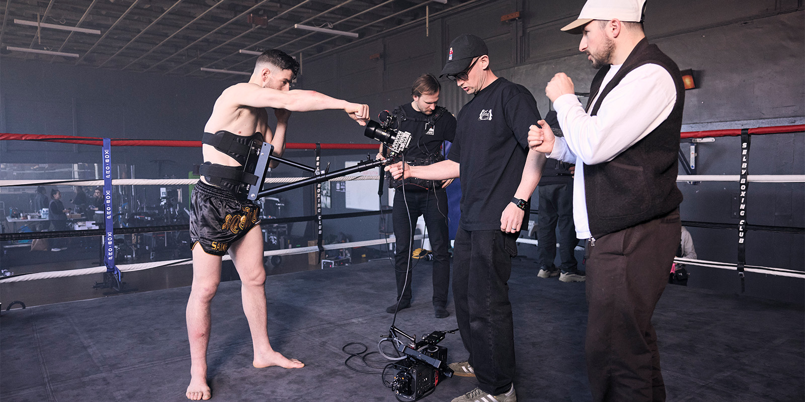 film crew in a boxing ring