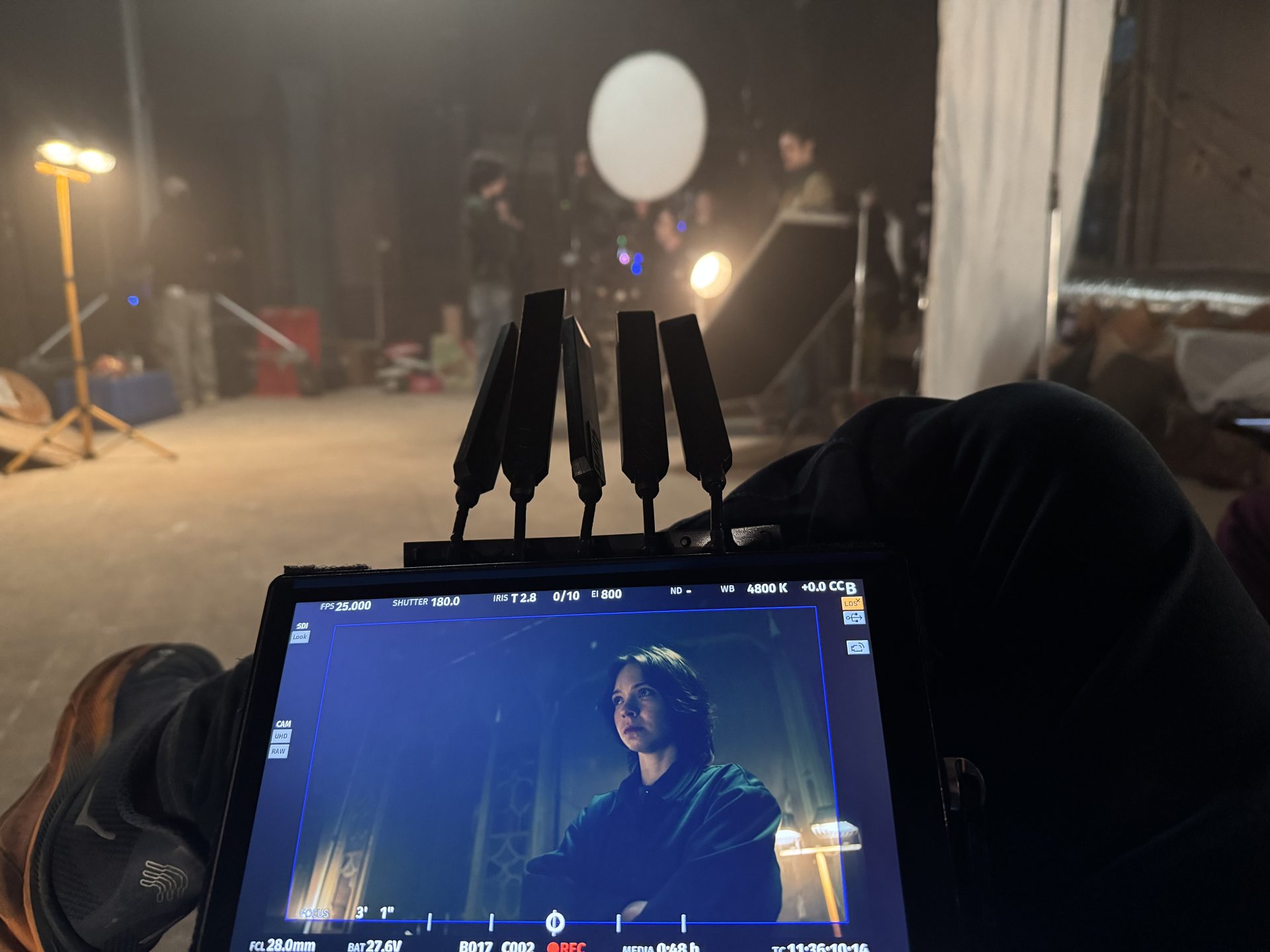 A person looking at a monitor
