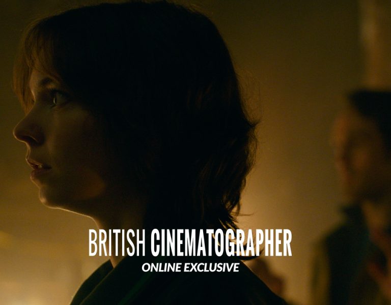 Two people in a dimly lit environment
