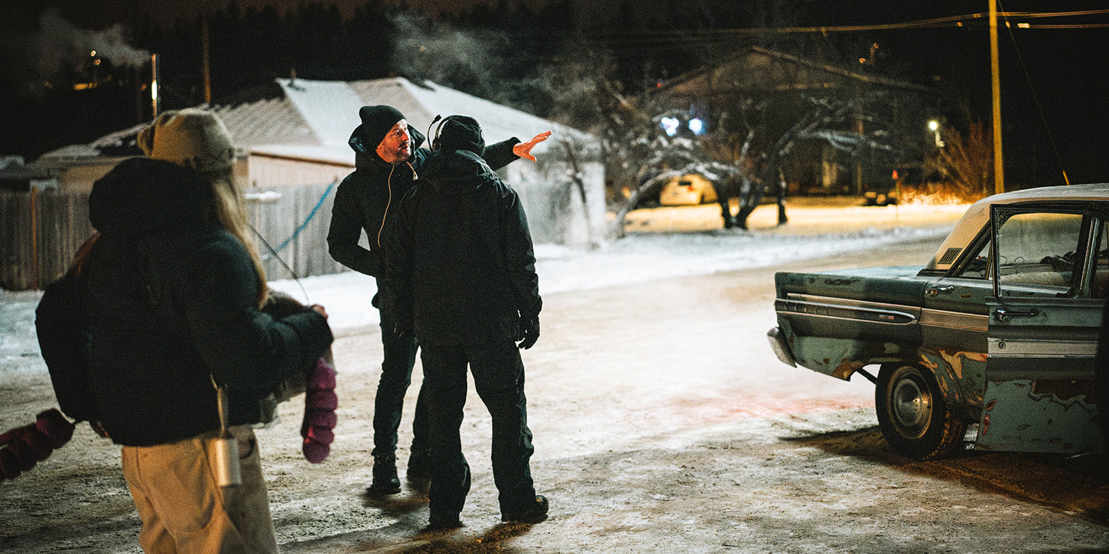 Film crew on set in a snowy location