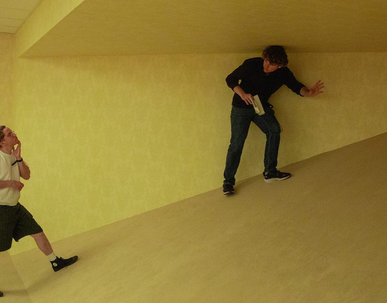 A director and cinematographer on the Backrooms set