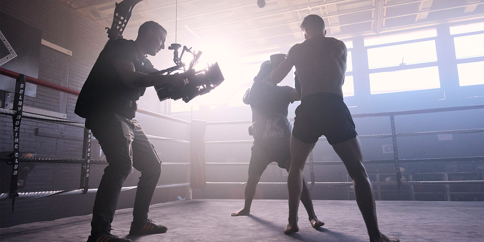 Film crew in a boxing ring 