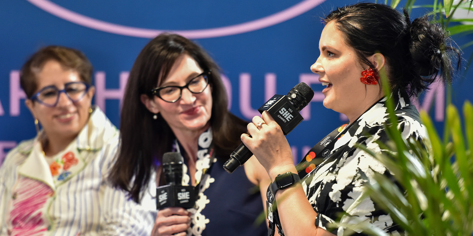 Women talking on a panel