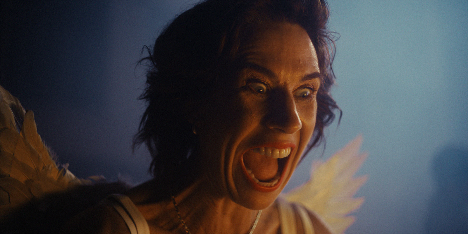 A woman screaming maniacally