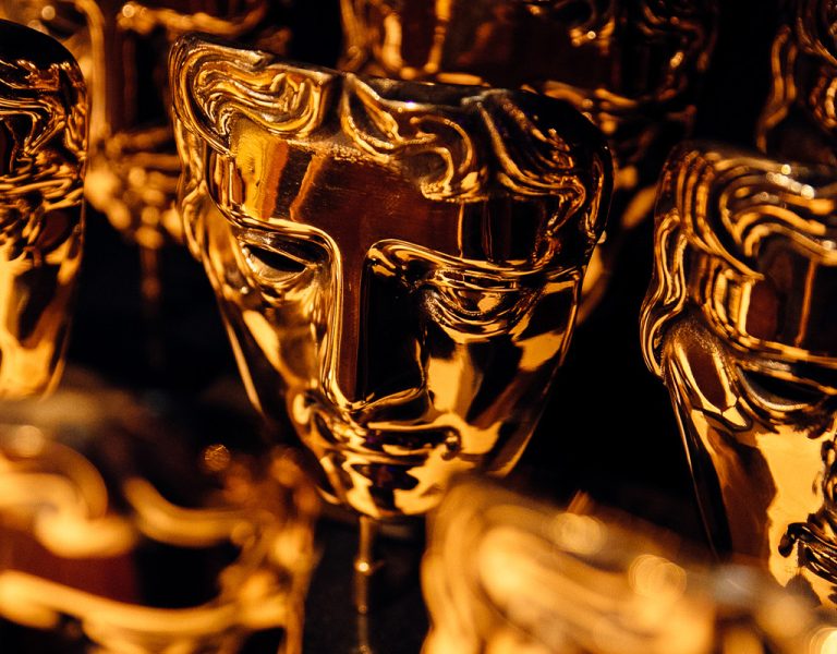 A table full of BAFTA trophies