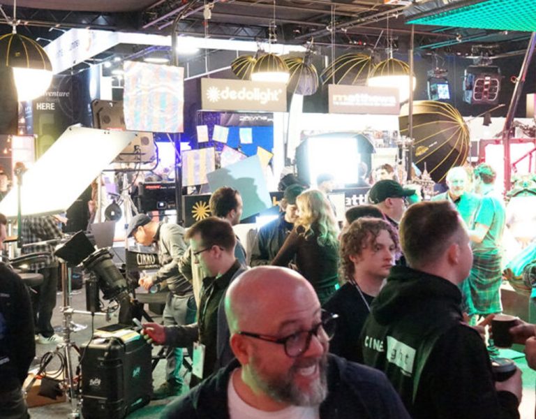 People gathered under bright lights