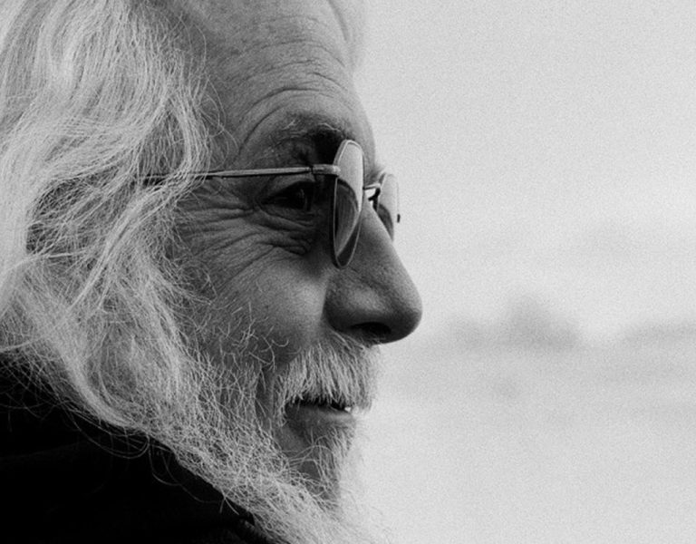 Robert Richardson wearing sunglasses and looking sideways