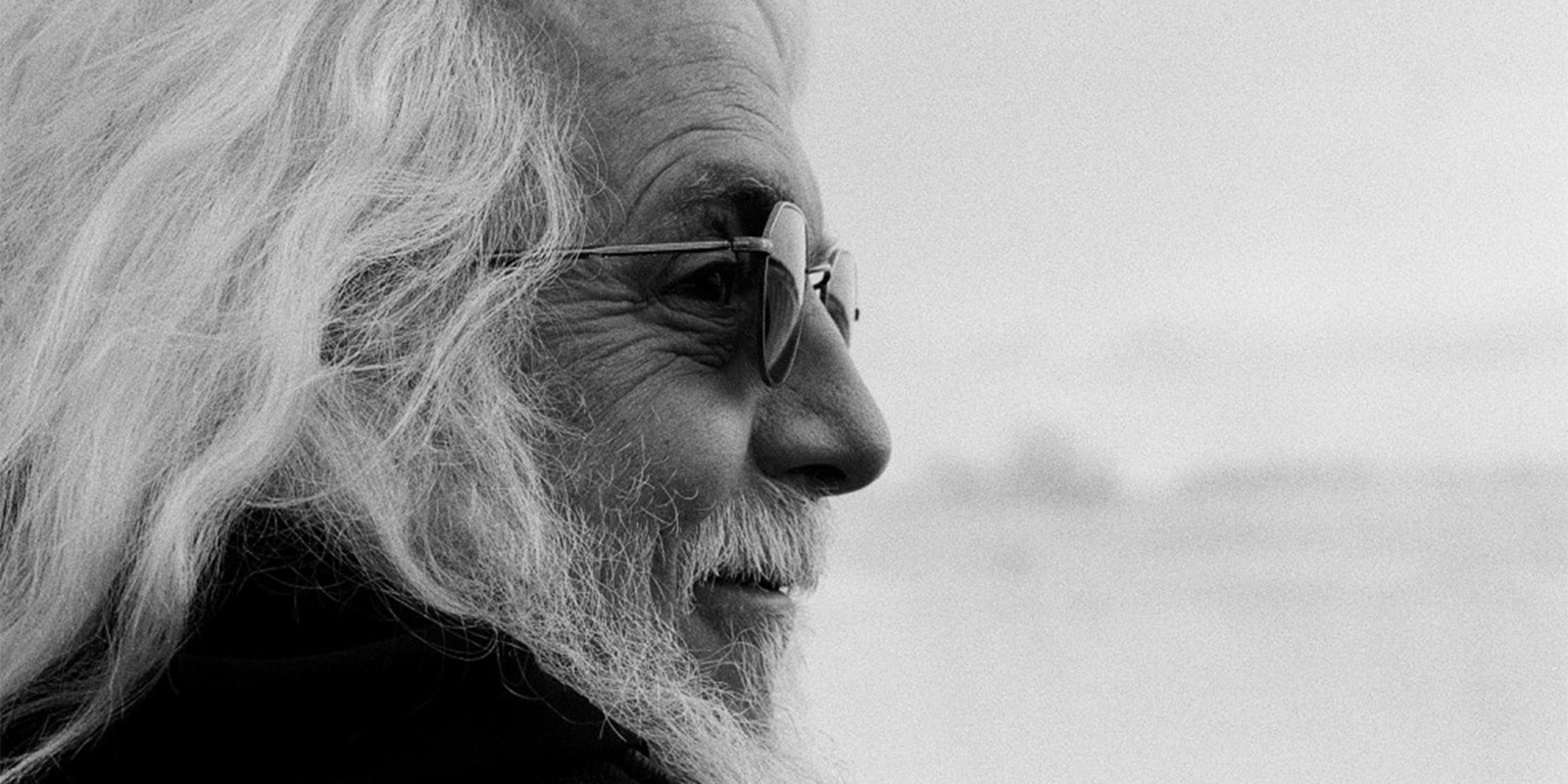 Robert Richardson wearing sunglasses and looking sideways