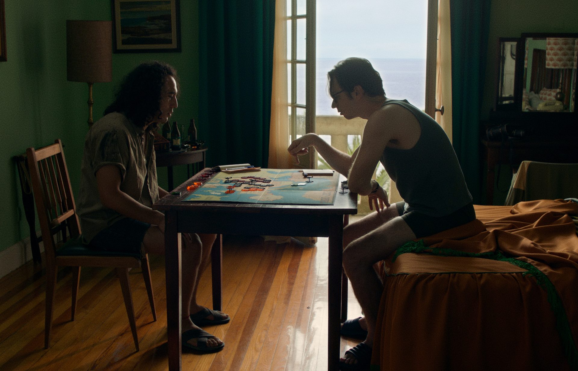 Two people sat by a small table