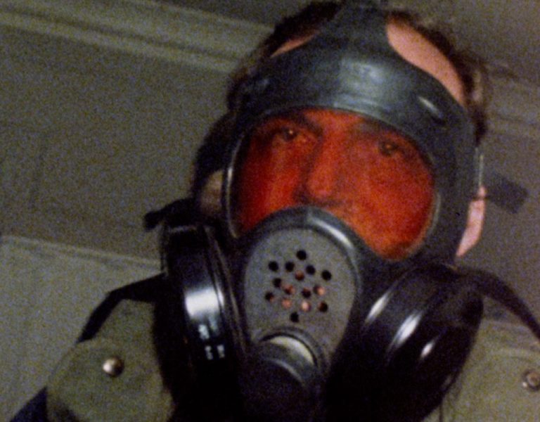 A man wearing a gas mask