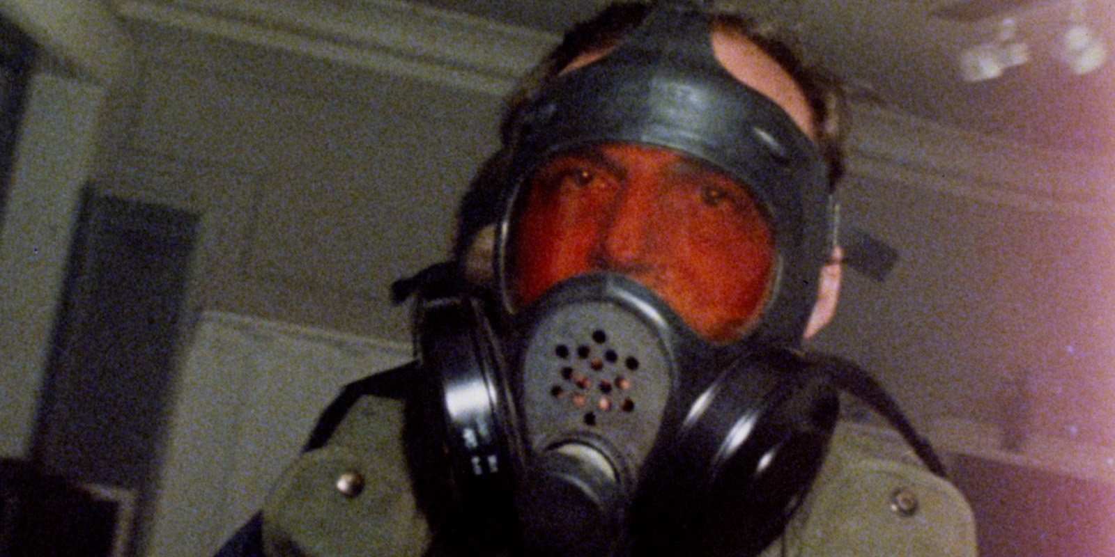 A man wearing a gas mask
