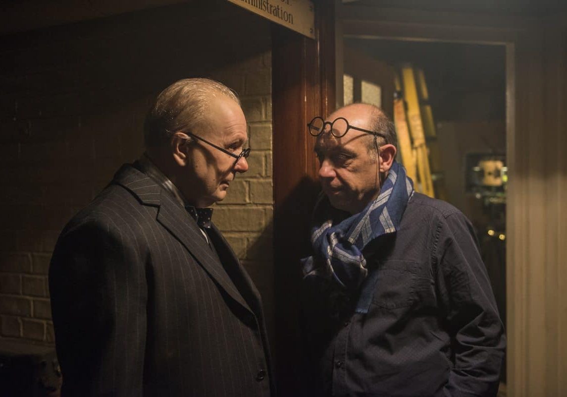Actor Gary Oldman and Director of Photography Bruno Delbonnel on the set of <em>Darkest Hour</em>. Credit: Jack English / Focus Features