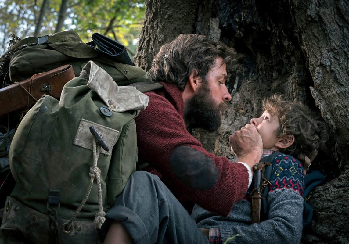 Left to right: John Krasinski and Noah Jupe in A QUIET PLACE, from Paramount Pictures.